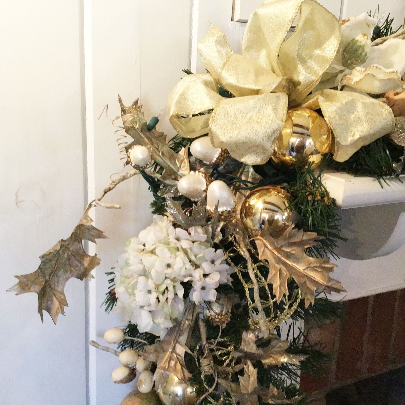Holiday Swag with white silk Magnolias Hydrengeas Silver Glass Bubbles Gold