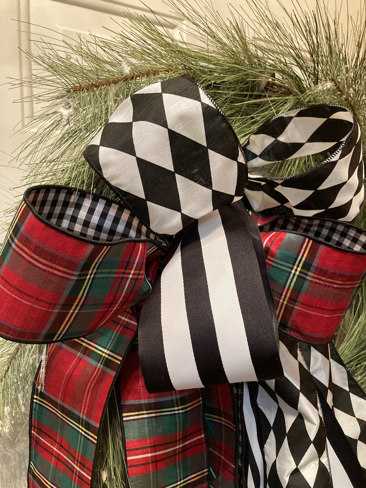 Long Snowy Needled Pine Wreath Wrapped In Exquisite Ribbon