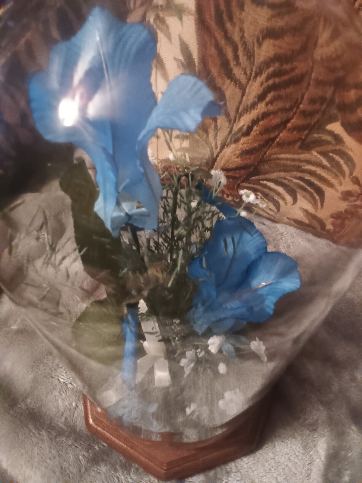 Glass dome blue,green and white artificial flower arrangement,wood base.