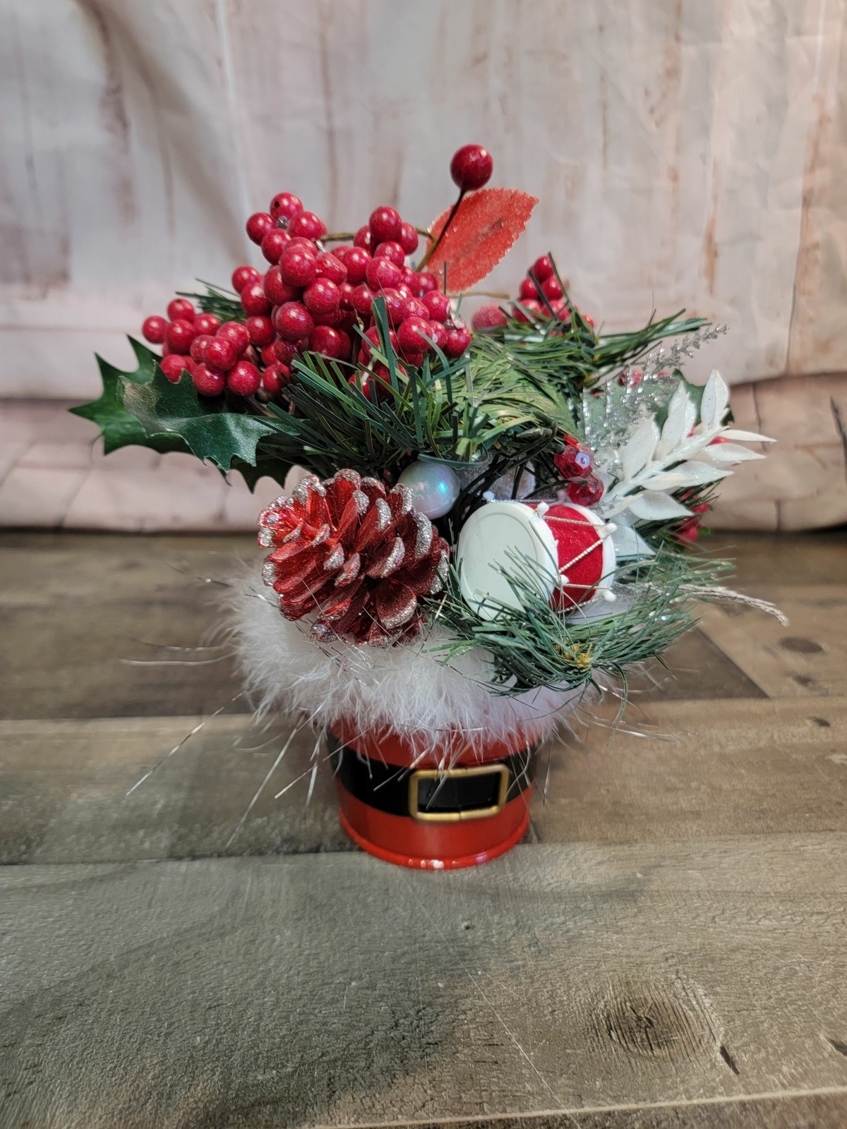 Santa bucket floral arrangement Mistletoe pine cone drum berry xmas decor