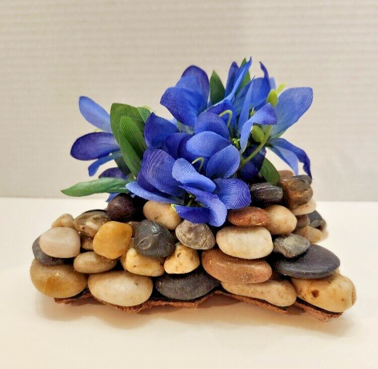 Touch of Spring, Lovely Blue Silk Flowers on a Bed of Polished Stones