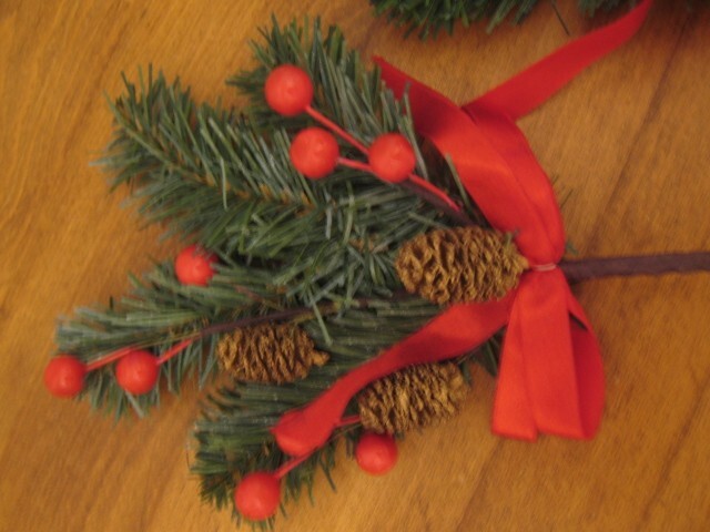 4 SPRINGS OF PINE, RED BERRIES, CONES & RED SATIN RIBBON