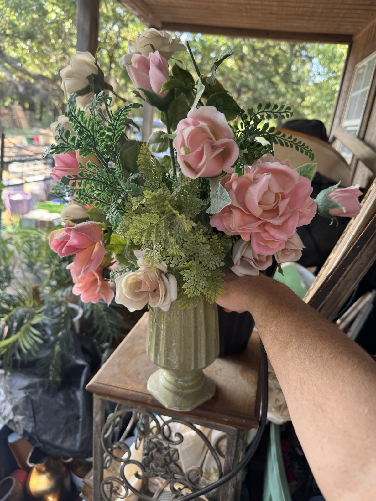 Faux Rose Flower Arrangement In Pottery Vase
