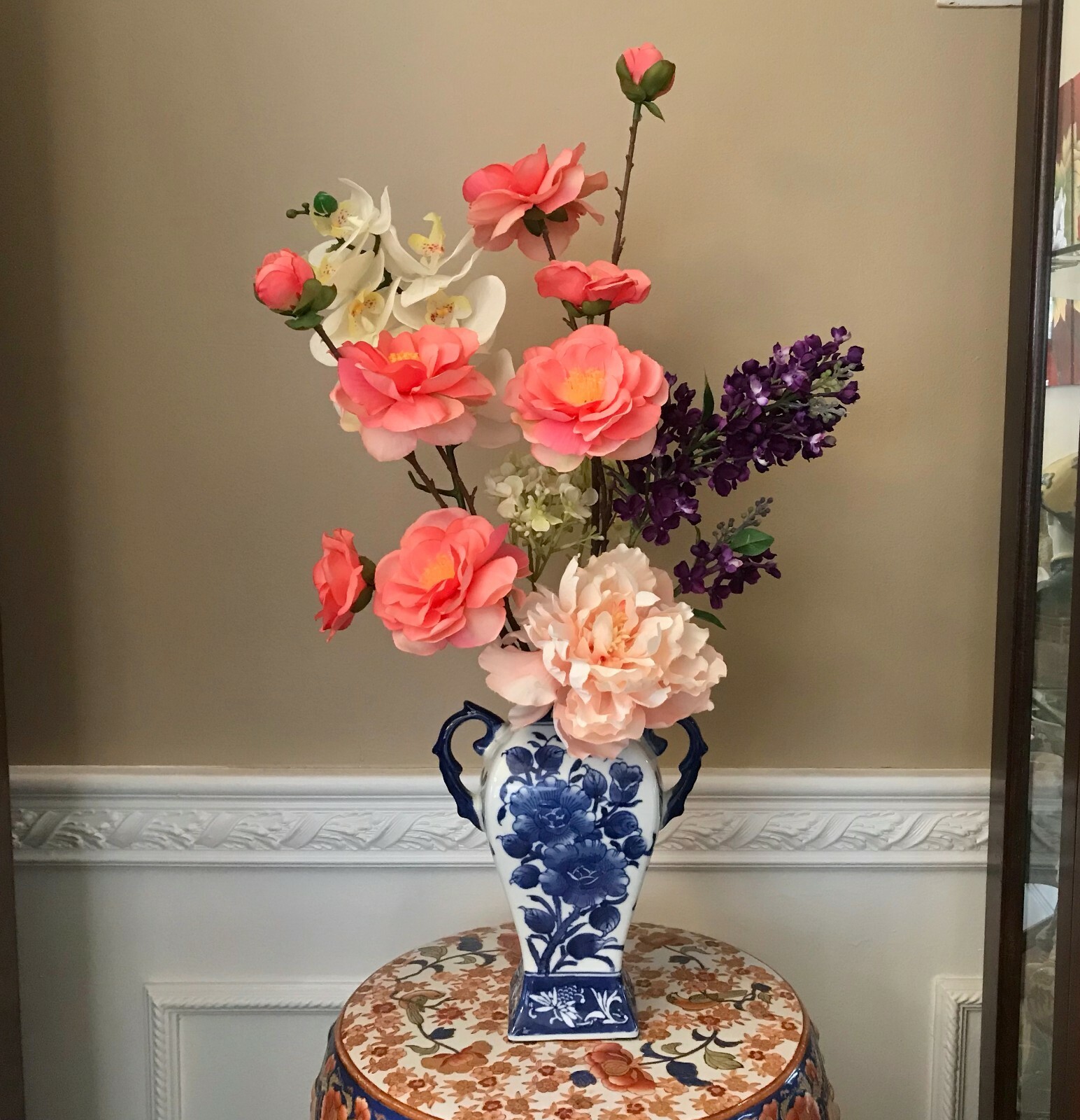Floral Arrangement with Multi-Colored Silk Flowers in a Blue and White Floral Va