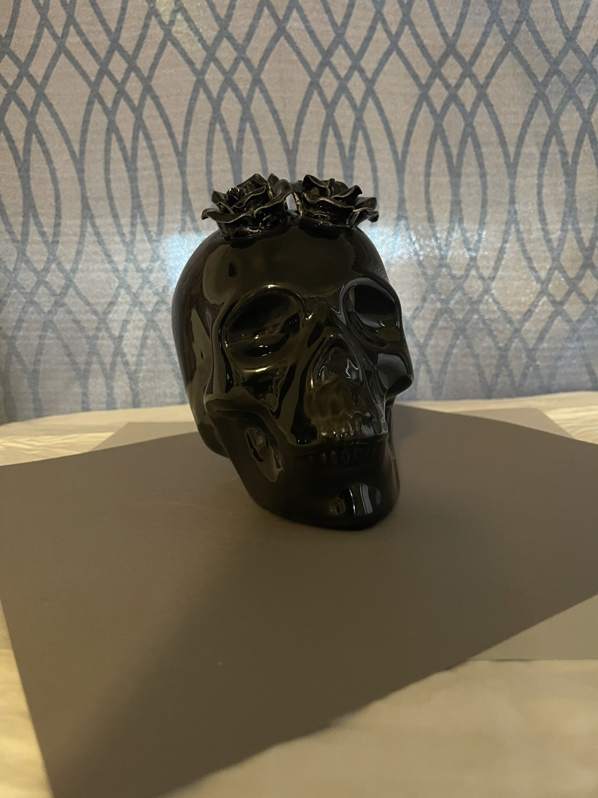black glossy skull decoration with faux black roses