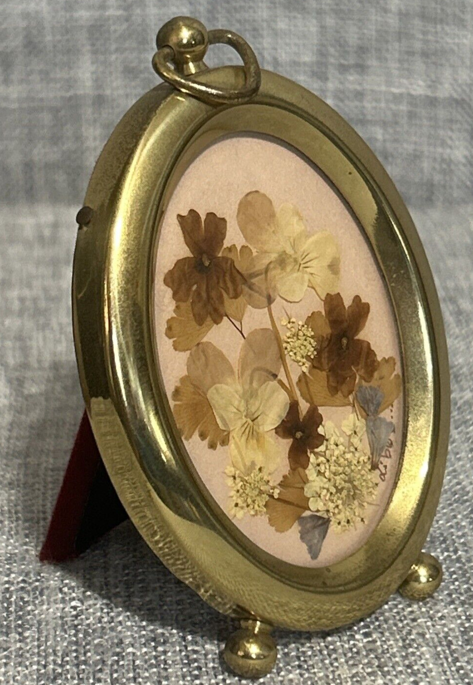 Beautiful Vintage Pressed Florals in a 4″ Tall Gold Tone Oval Frame