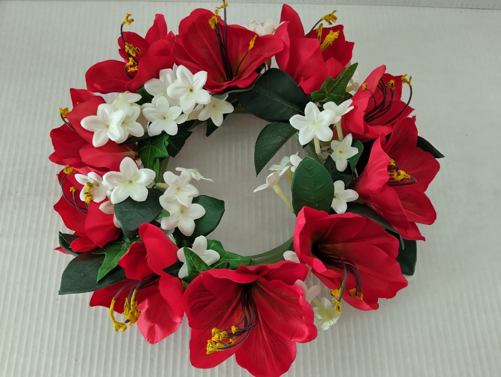 Bright red Amaryllis candle ring for a 6″ pillar candle or cremation urn.