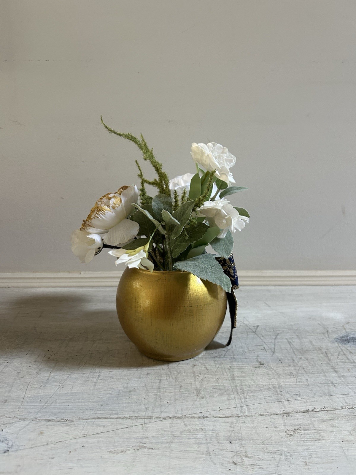 Sage Green White And Gold Floral Arrangement With Navy And Gold Bow