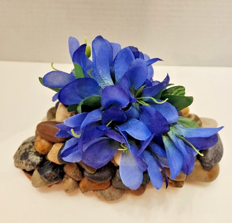 Touch of Spring, Lovely Blue Silk Flowers on a Bed of Polished Stones