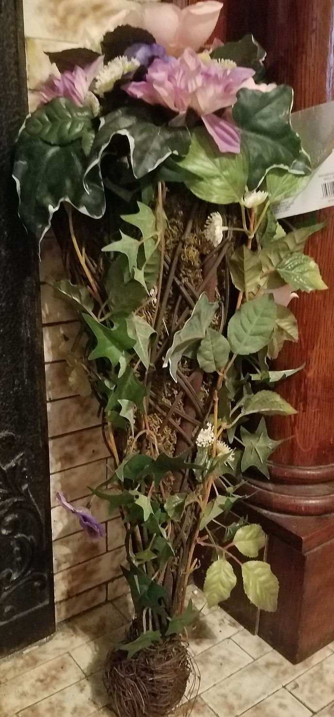 Faux Flower Arrangement In Vine And Moss