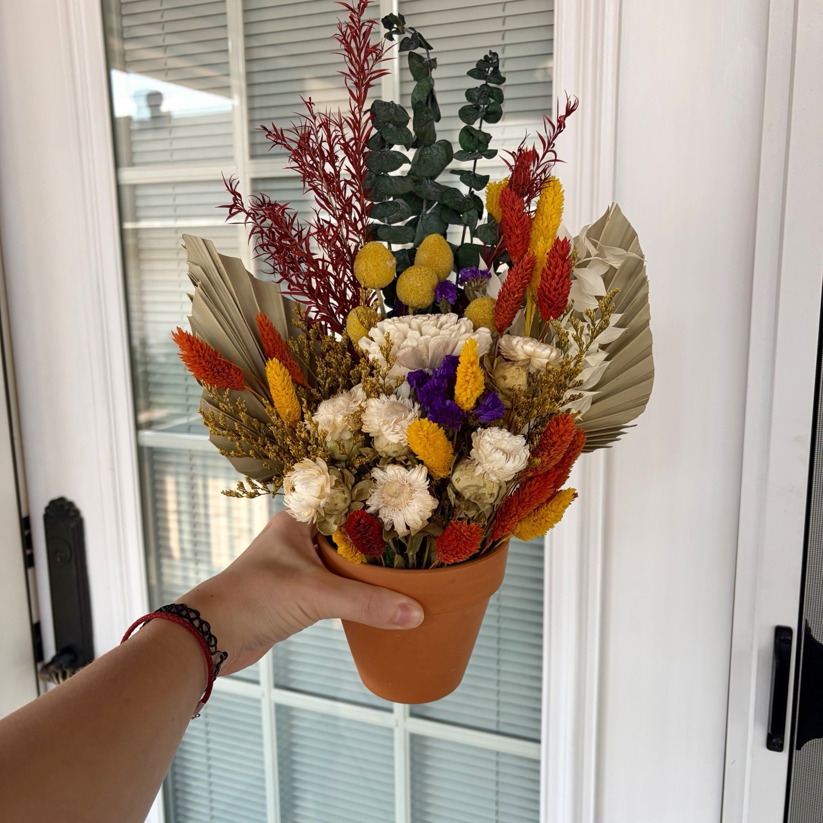 Artificial And Dried Flower Arrangement