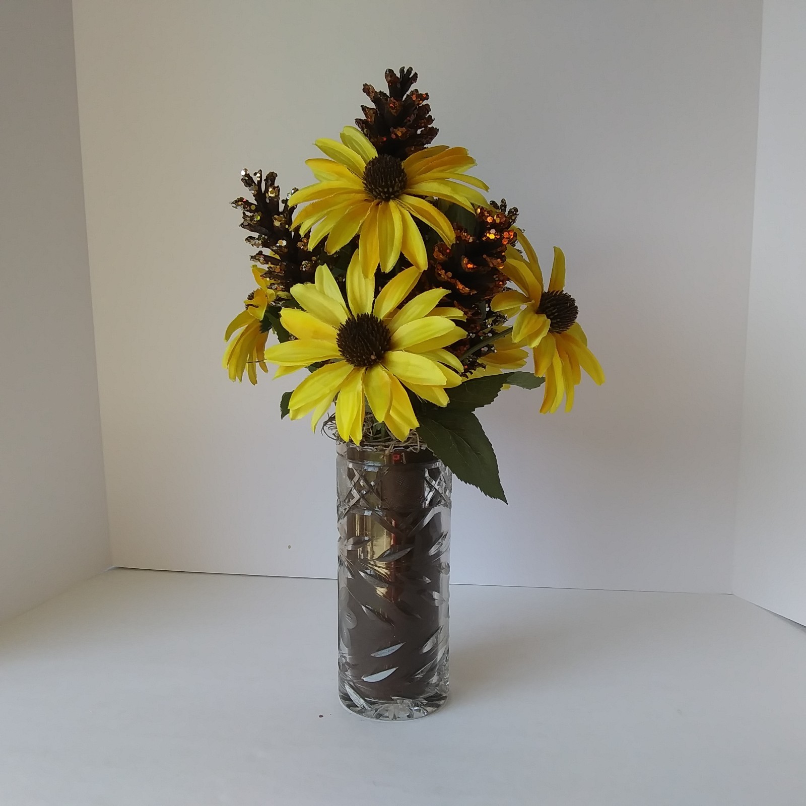 Artificial Yellow Sunflower & Pinecone Fall Arrangement in Cut Glass Vase Decor