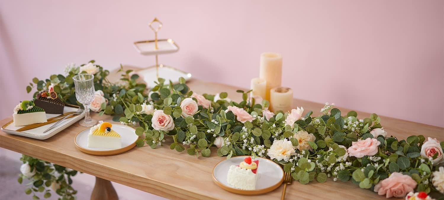 Artificial eucalyptus wreath with flowers, fake roses, and baby’s breath flowers