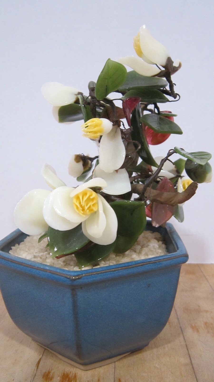 Vintage Japan glass flowers in blue bowl – 7-1/2″ high – yellows & greens VGC