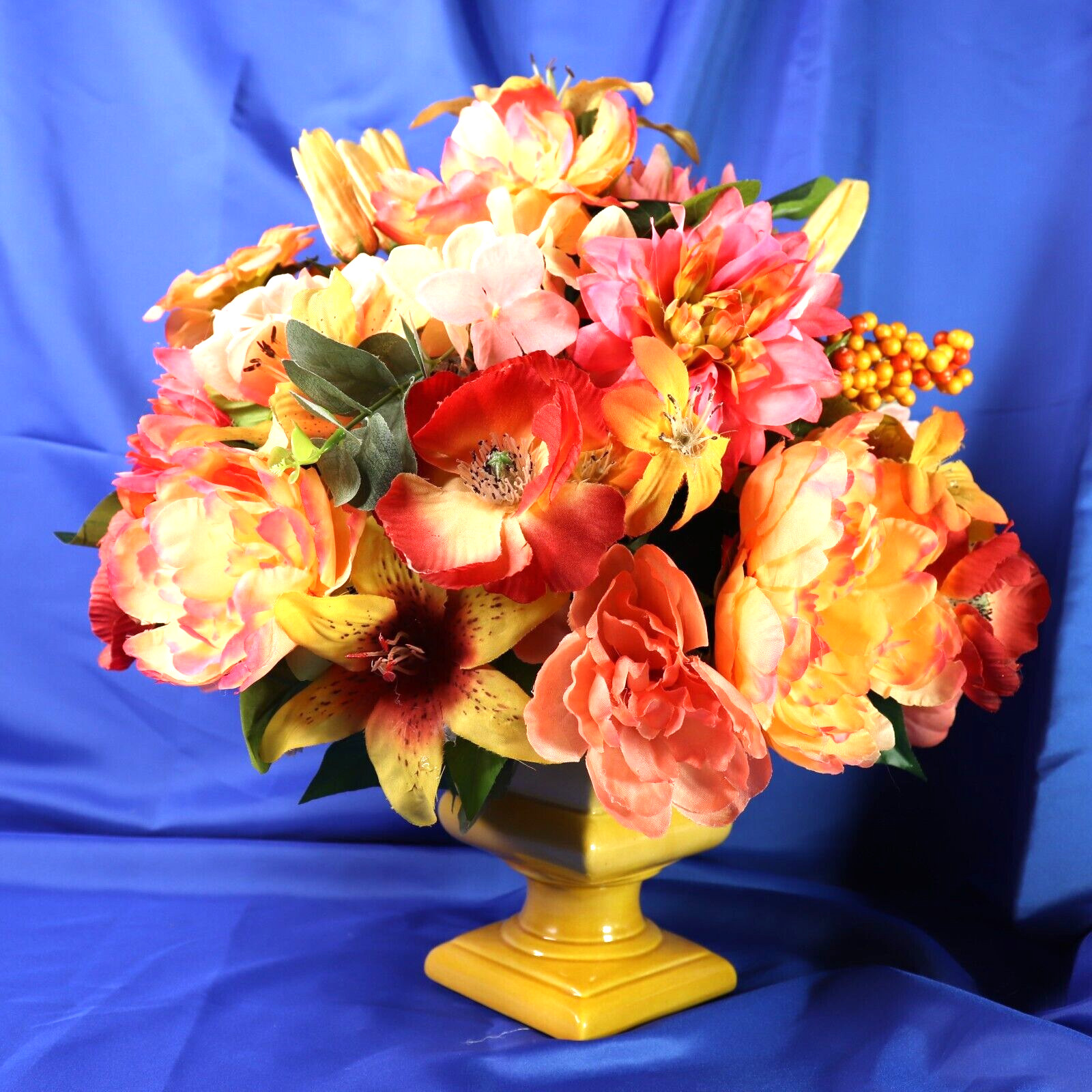 Lovely Floral Arrangement In Shades of Coral Pink & Yellow in a Square Planter