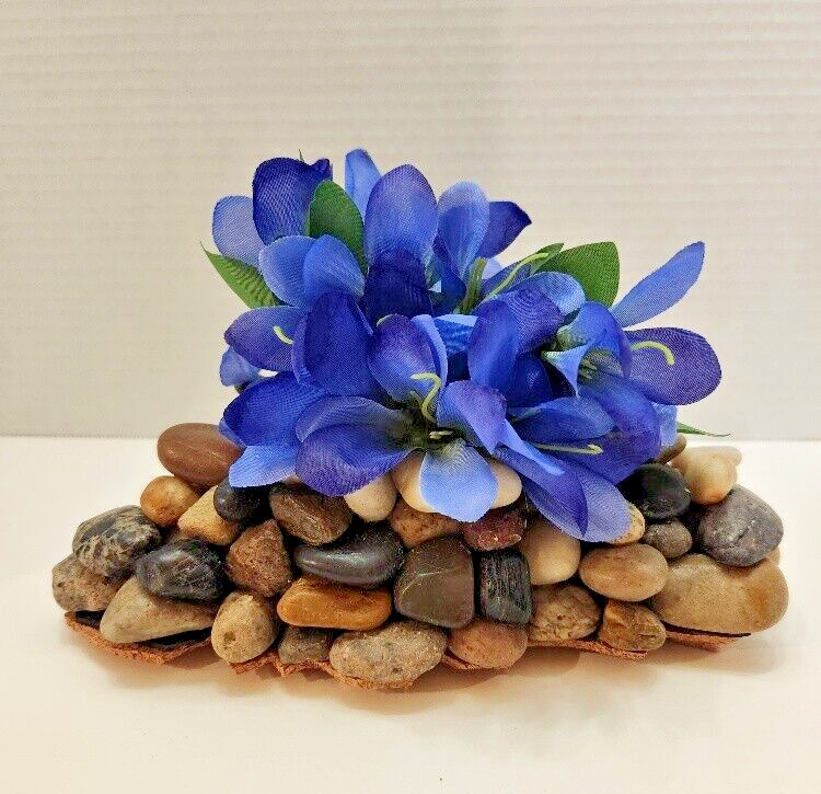 Touch of Spring, Lovely Blue Silk Flowers on a Bed of Polished Stones