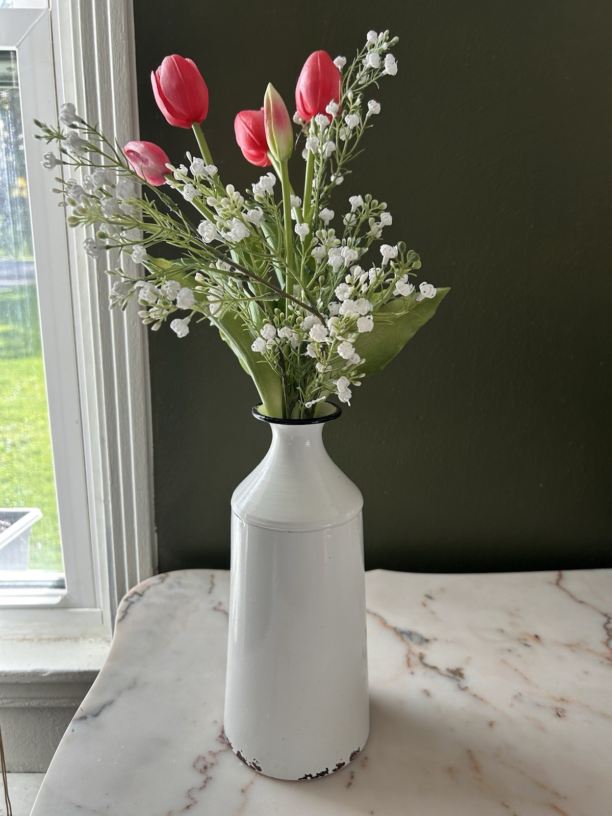White Bottle Flower Vase with Fake Pink Tulips and Baby’s-Breath.