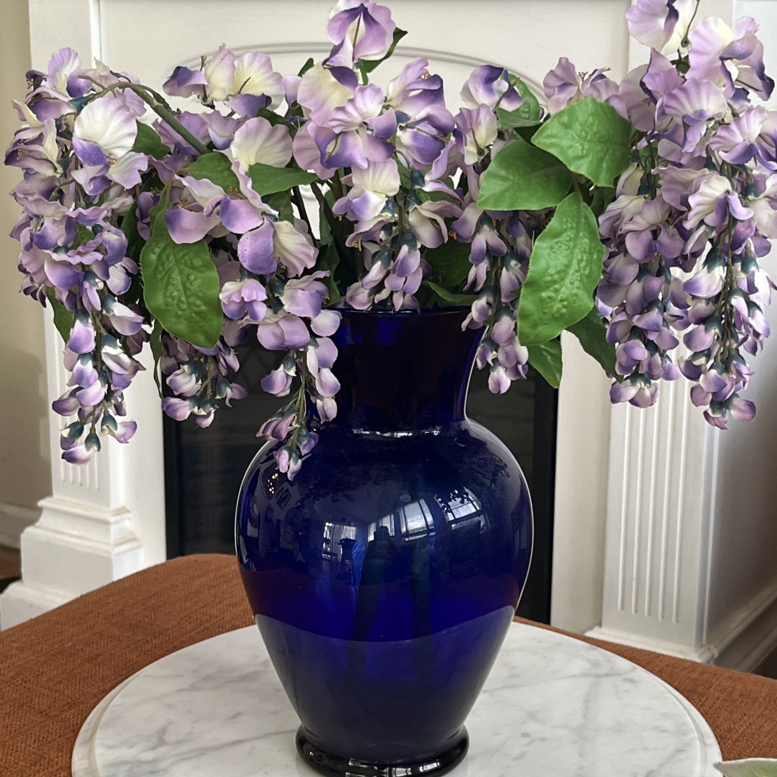 Flower Arrangement Cascading, Wisteria Purple in Cobalt Blue Glass Vase