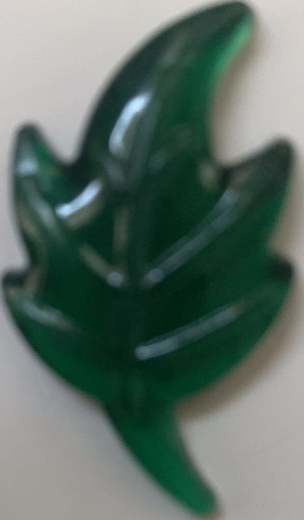 Bag of plastic leaves to scatter for Autumn decoration. Green,red,gold & violet 