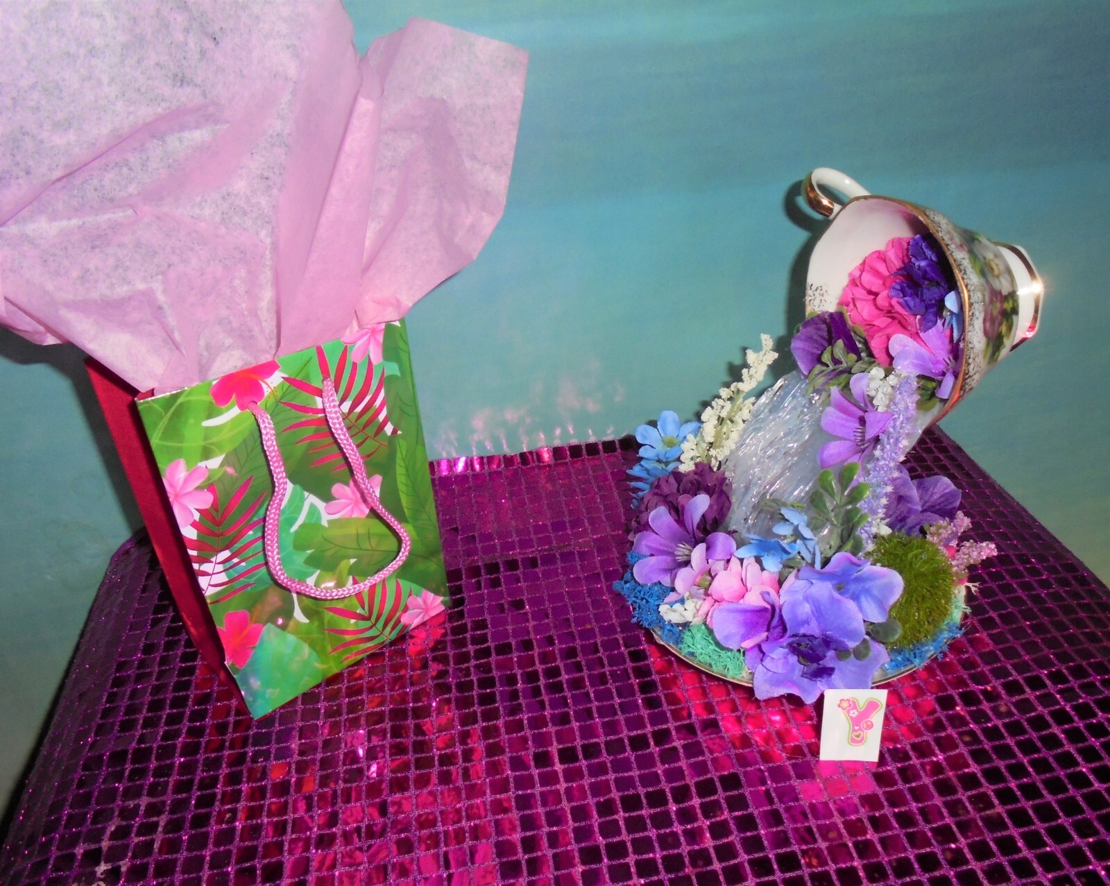 Floating Teacup floral arrangement Item # Y 