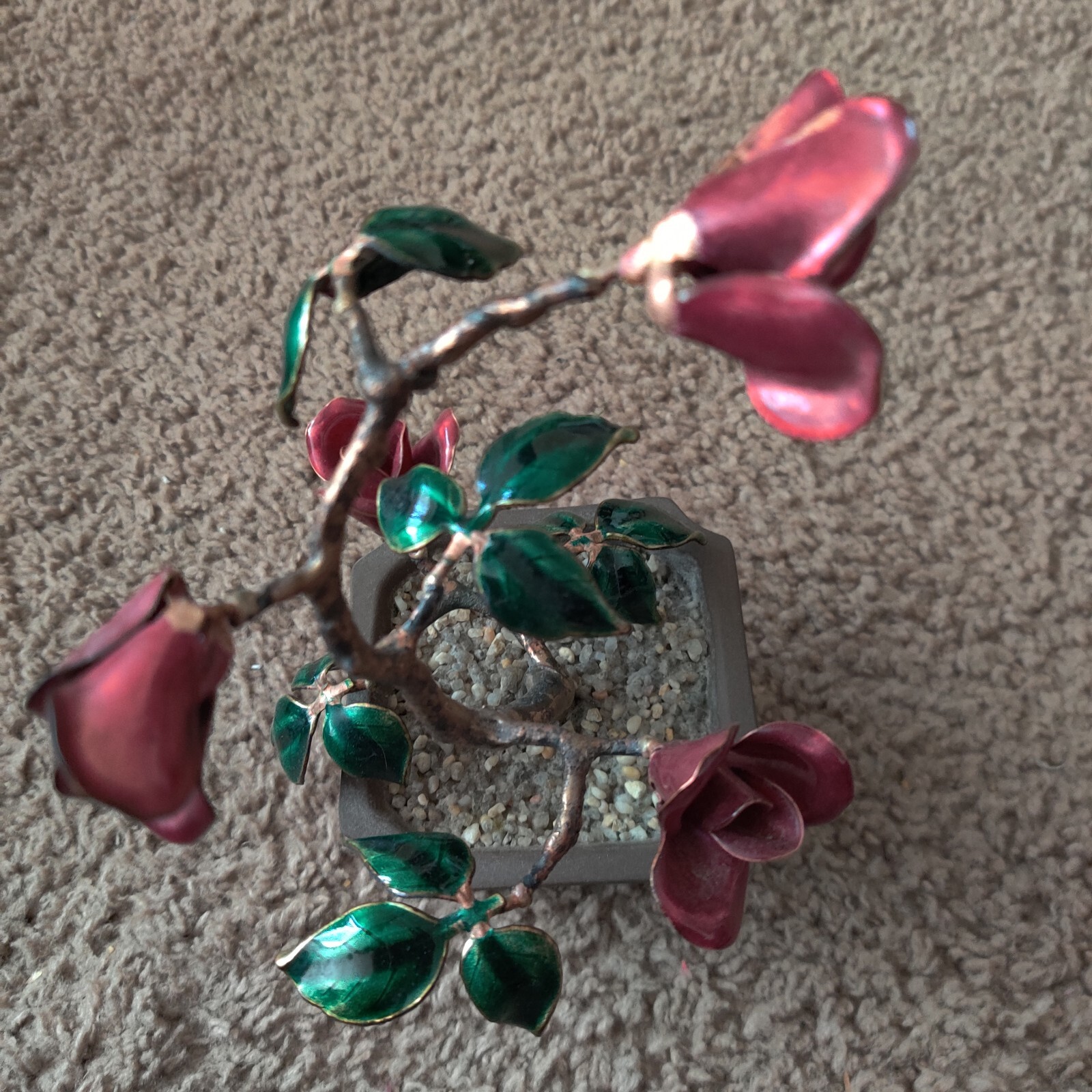 Metal Rose Bush. Enameled Roses And Leaves In Planter With Natural Stone