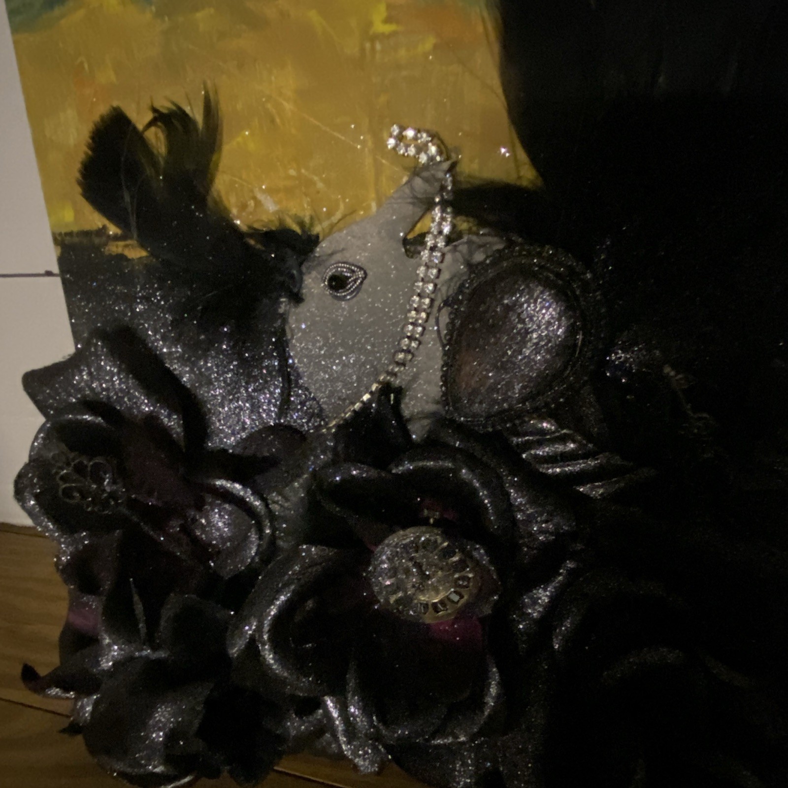 Silver/black crow w/jewels flower feather embellished