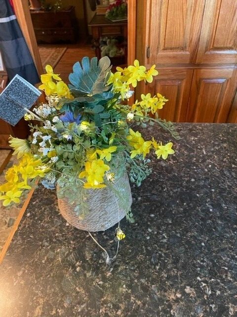 Hand made bee hive flower, with bees that light up, battery is included.