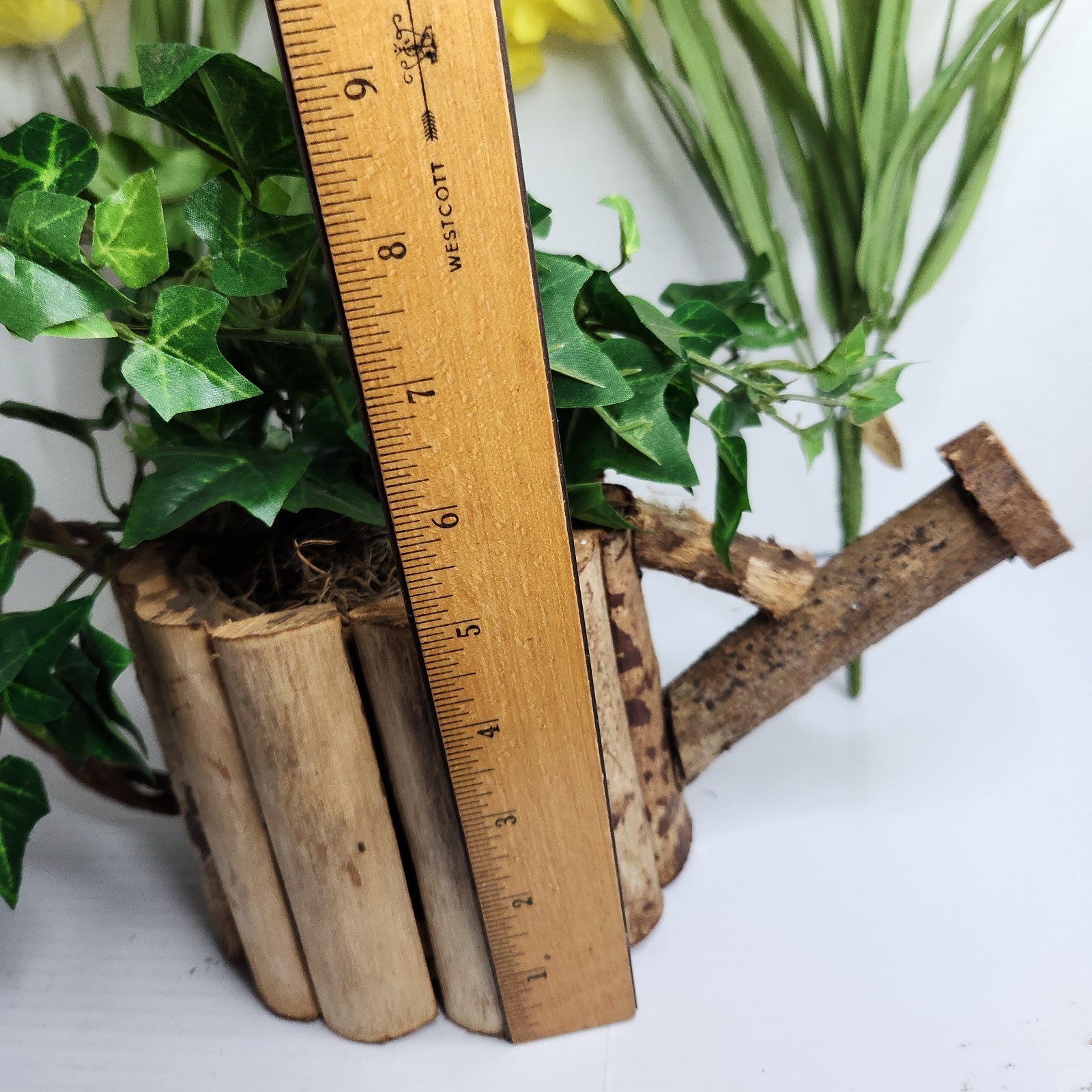 Vintage World Bazaar Faux Daffodil Flowers Rustic Log Watering Can Planter Decor