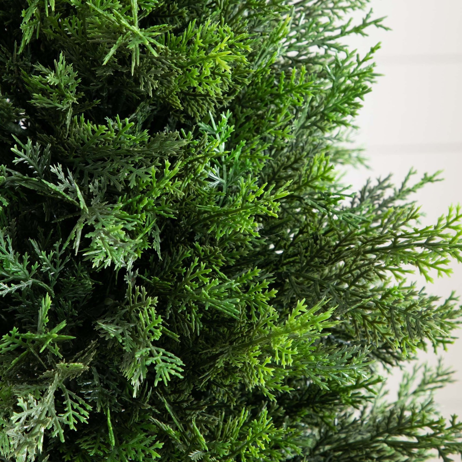 Nearly Natural 3ft UV Resistant Cedar Tree in White Planter in Green