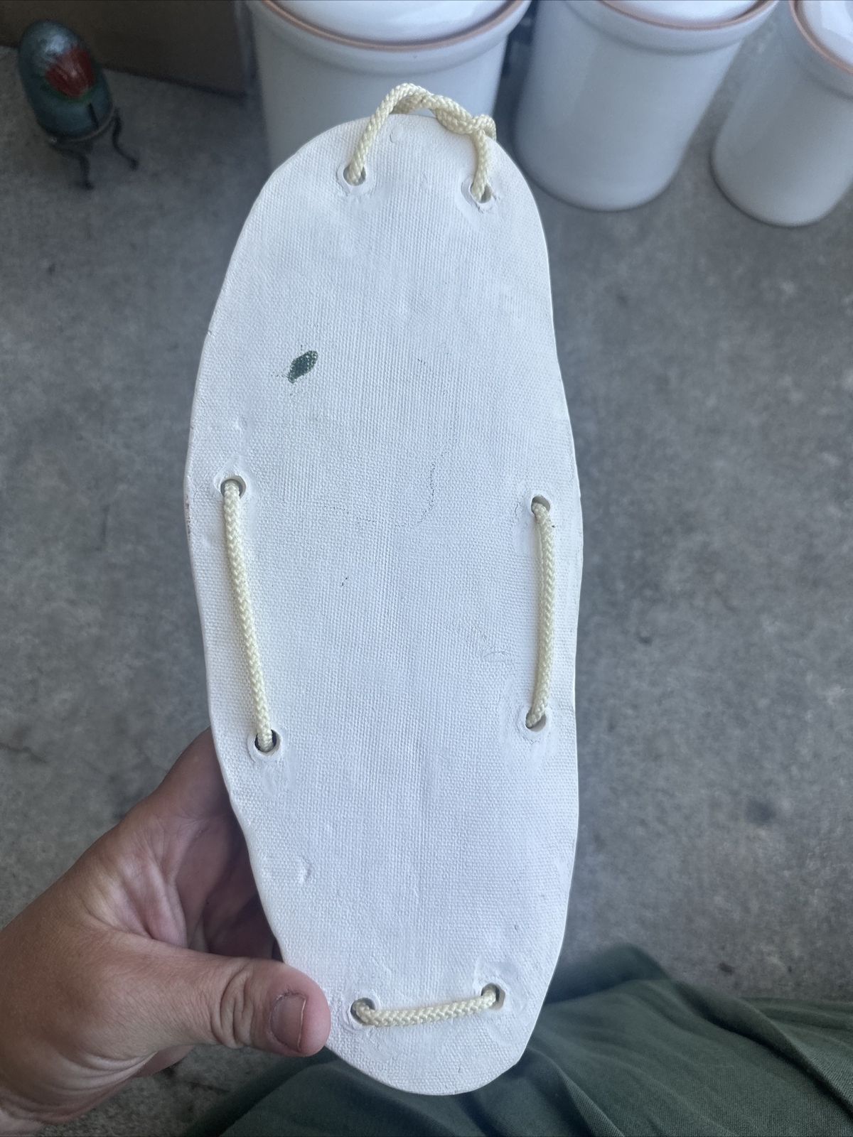 STONEWARE DEBOSSED FLORAL WALL HANGING WITH GLAZE
