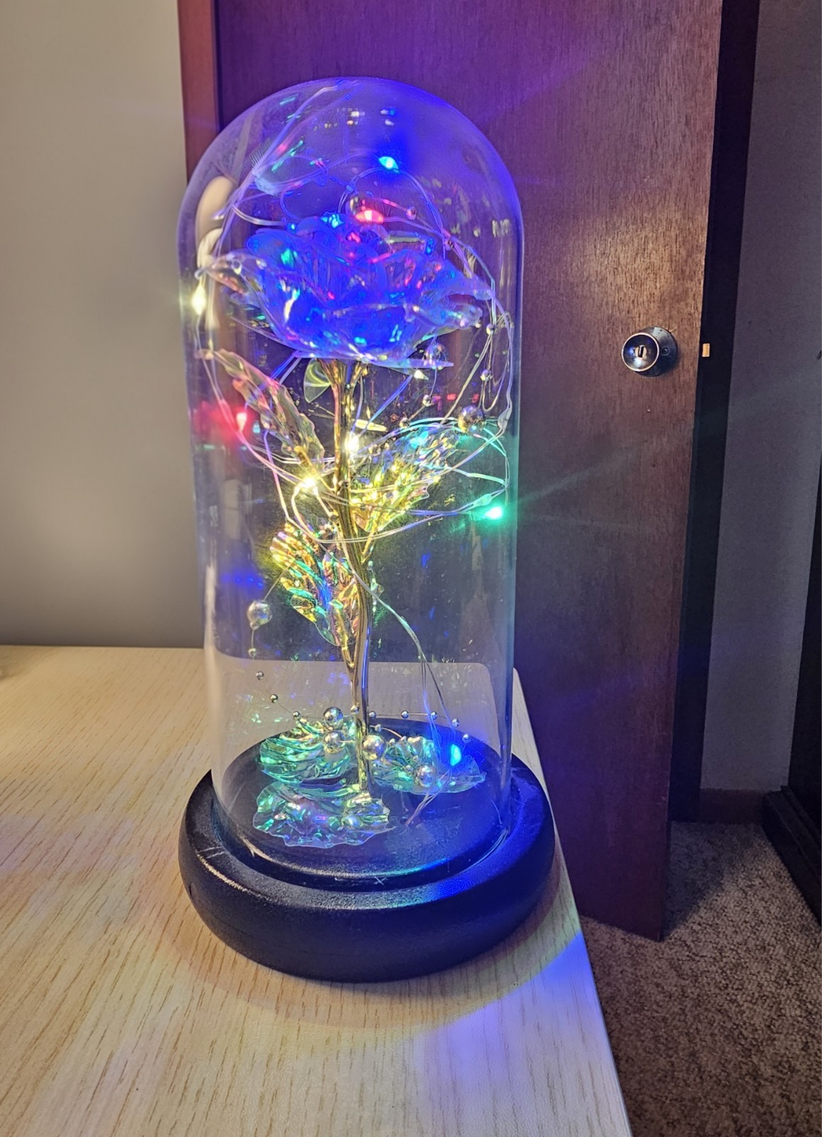 Iridescent Color Changing Flower In Glass Dome