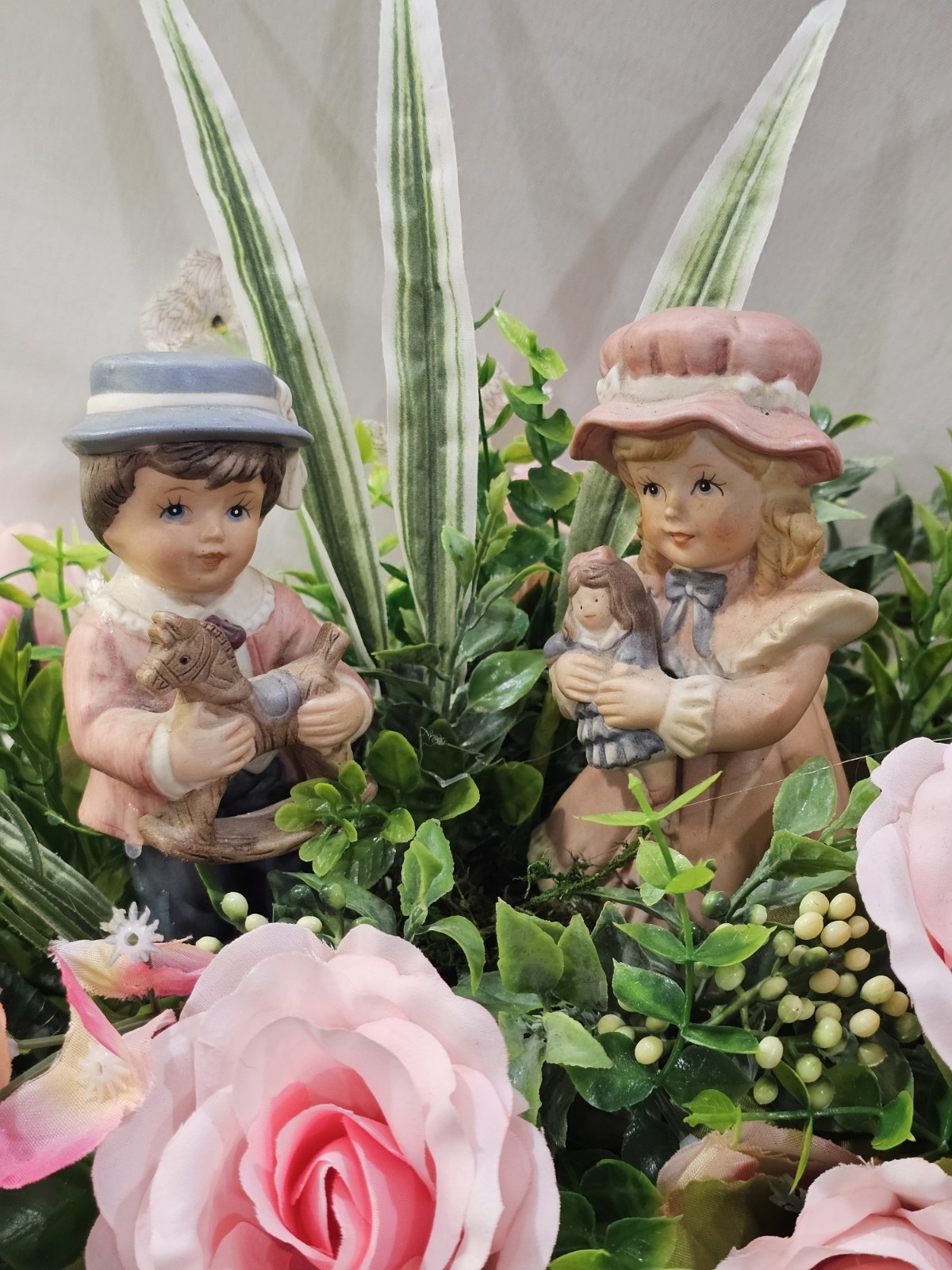 Lovely Floral Centerpiece, Pink Roses, 2 darling children. 15″W in solid wood