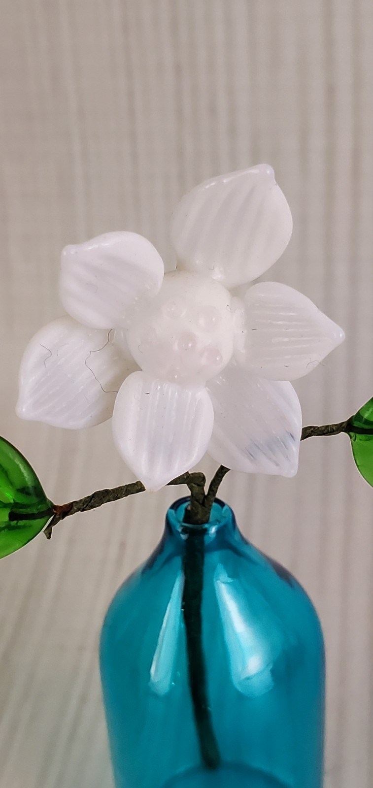 Tiny Glass Flower in Blue Vase 3.5″ tall – White Glass Flower & Green Leaves
