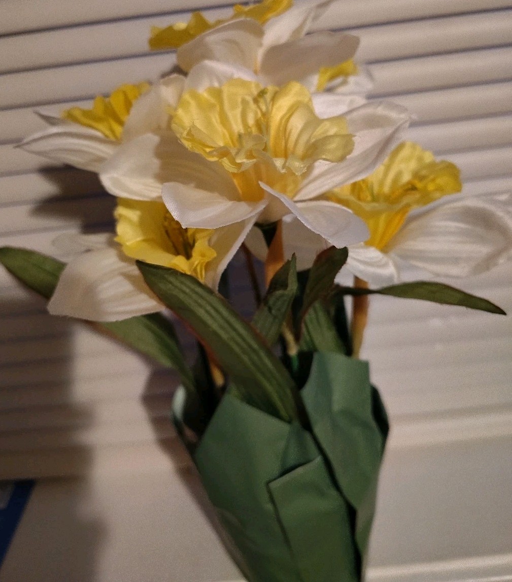 Artificial Yellow And White Daffodils In Pot With Paper