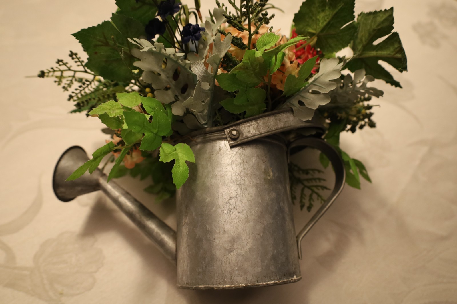 Spring Multicolor Artificial Floral in a Watering Can Table Decoration
