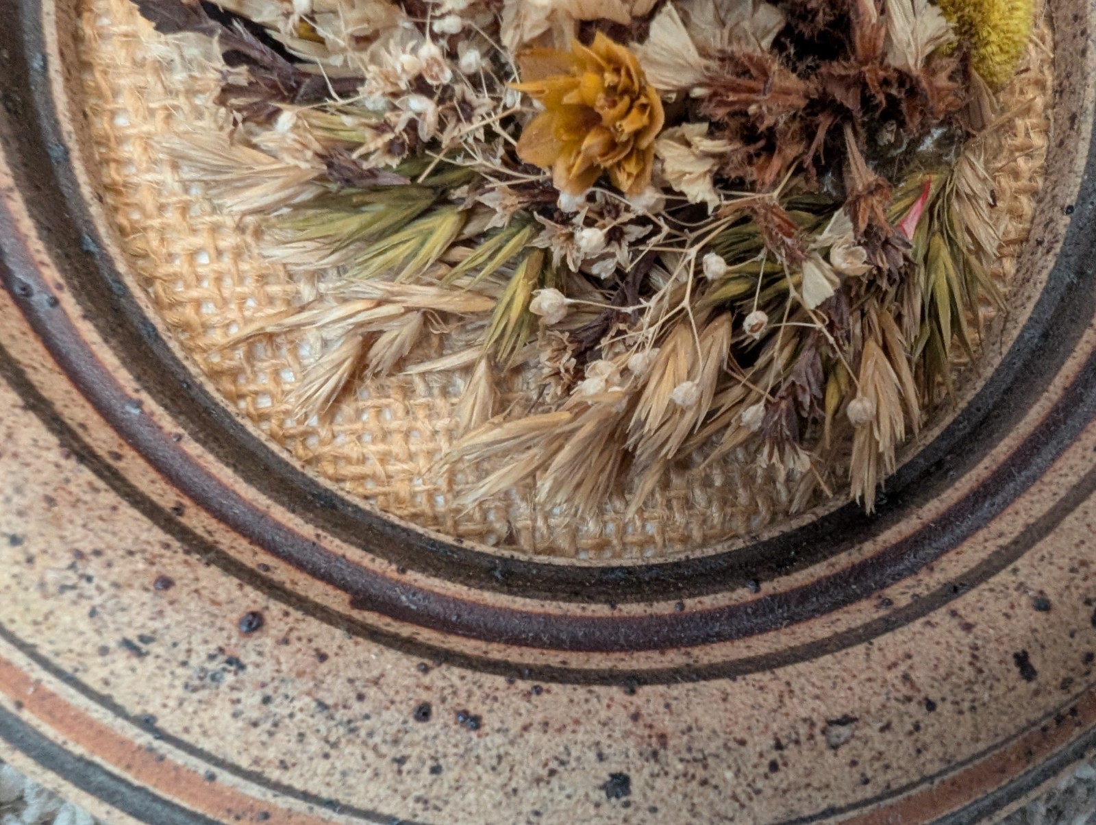 Dried flowers wall hanging round pottery circle speckled floral art boho fall