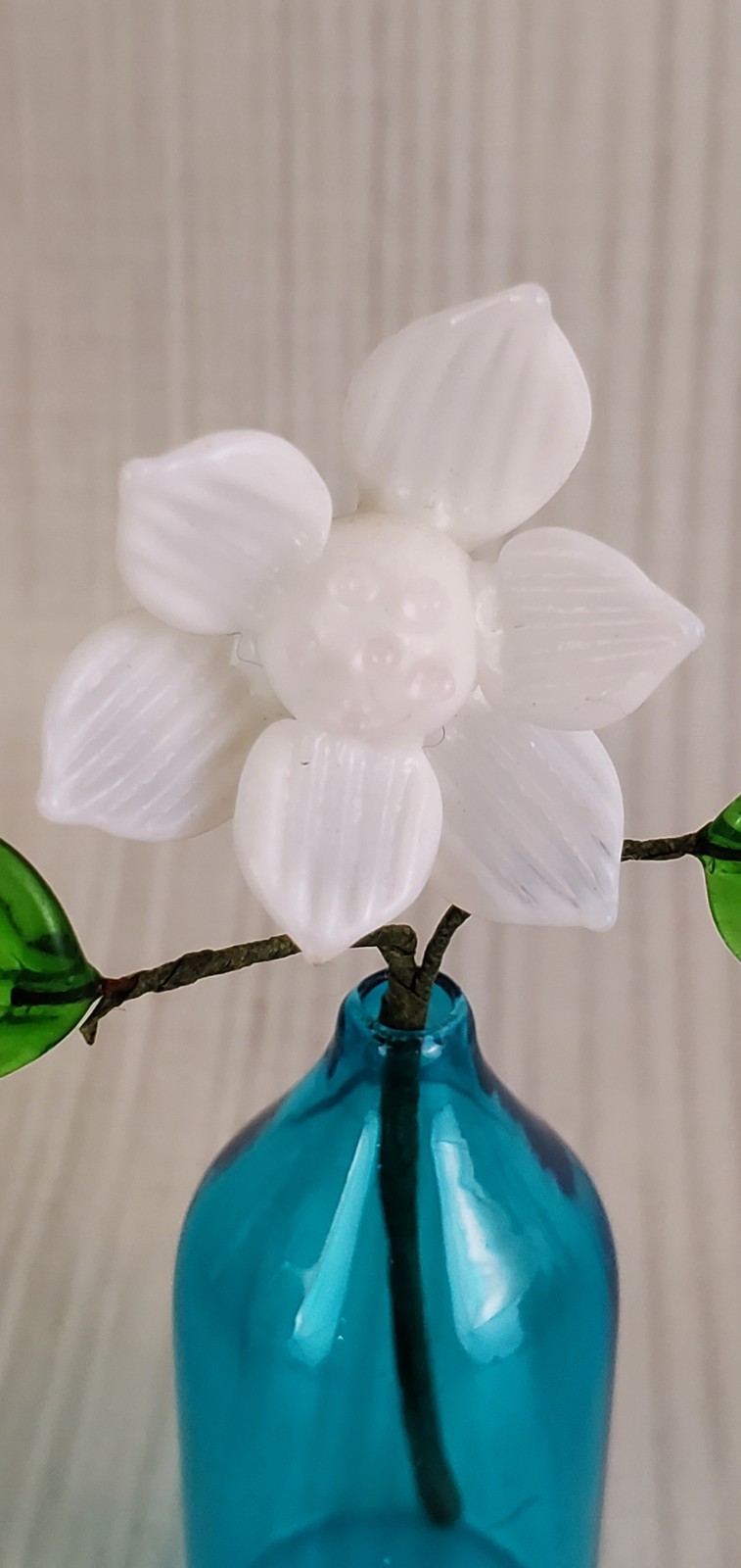 Tiny Glass Flower in Blue Vase 3.5″ tall – White Glass Flower & Green Leaves