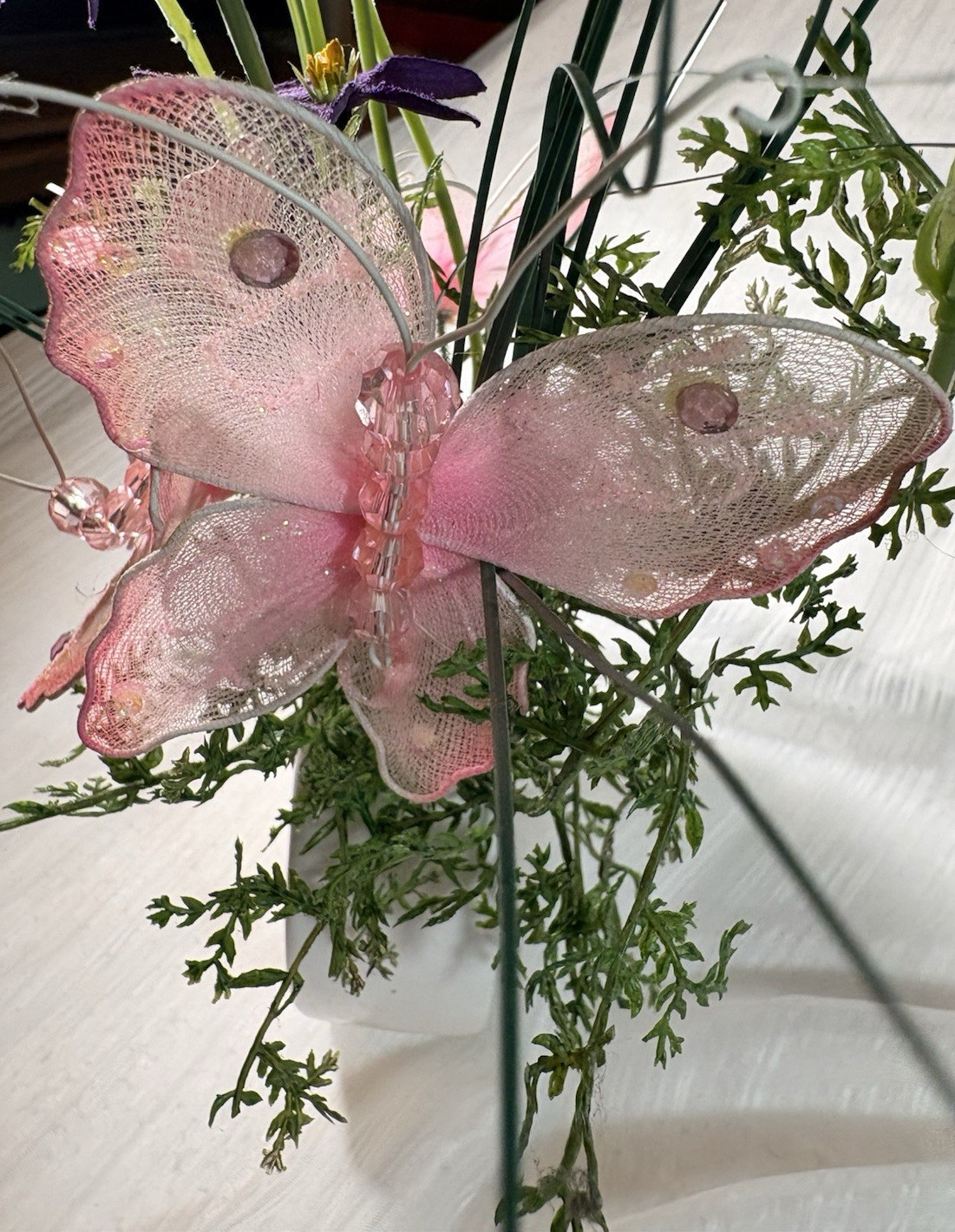 Artificial Purple Flower Arrangement with Pink Butterfly in White Ceramic Vase