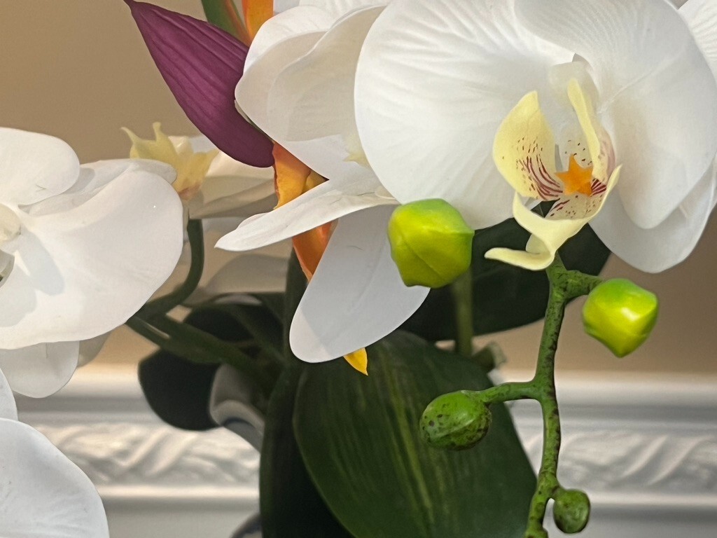 Floral Arrangement with Multi-Colored Silk Flowers in a Blue White Vase