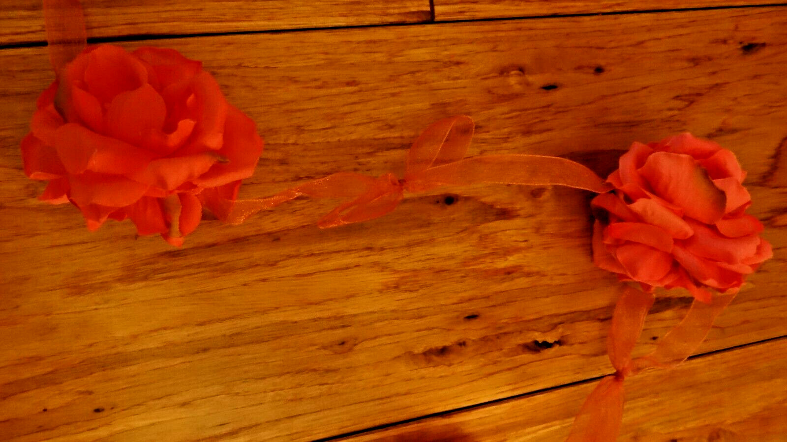 Pink Silk Rose Floral Garland Attached To Pink Organza Ribbon