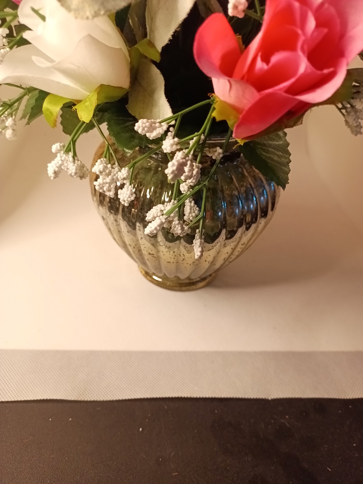 Beautiful Pink And White Floral Bouquet And A Silver Face Realistic Desk…