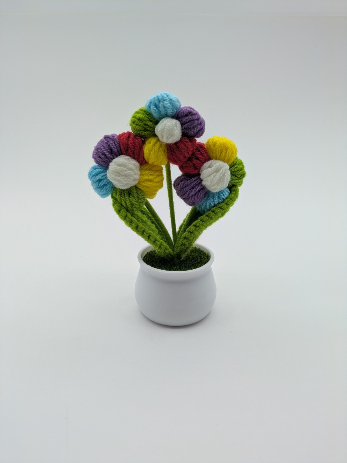 Hand Made Yarn Crochet Rainbow Petal Flowers in White Plastic Pot