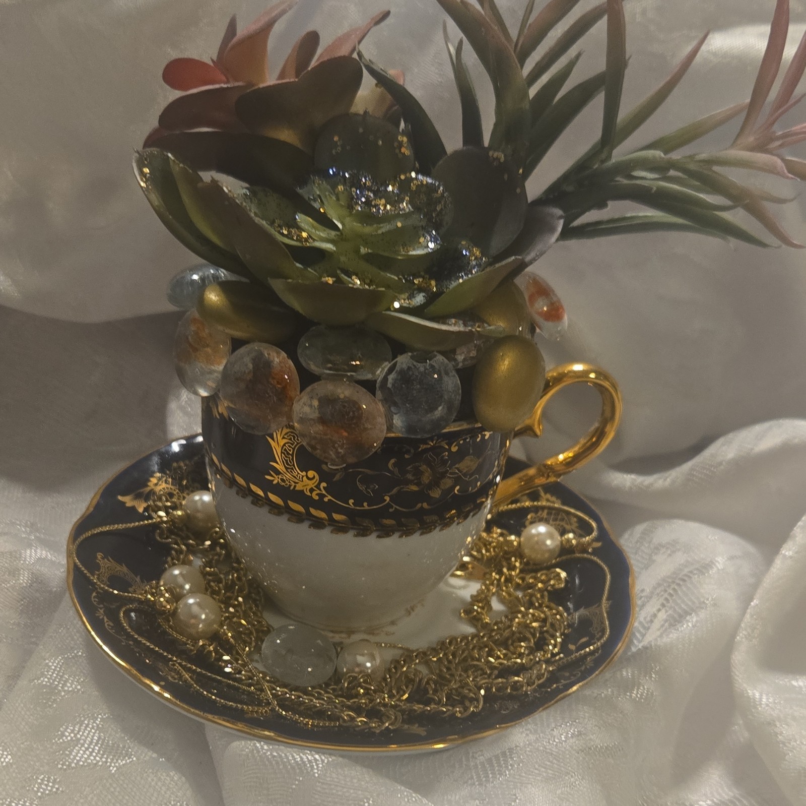 Artificial Succulent Floral Arrangement Ceramic Teacup & Saucer, Beads Chain