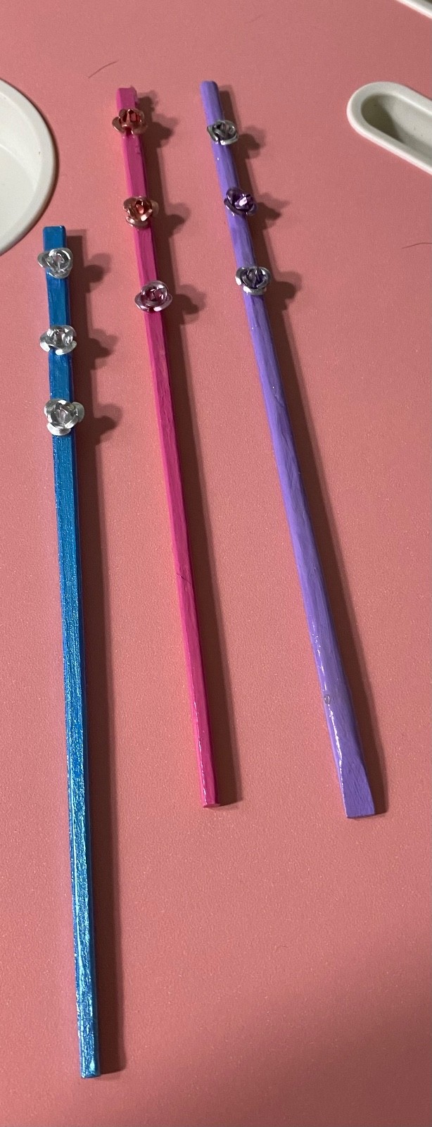 3 plant stakes/metal flowers