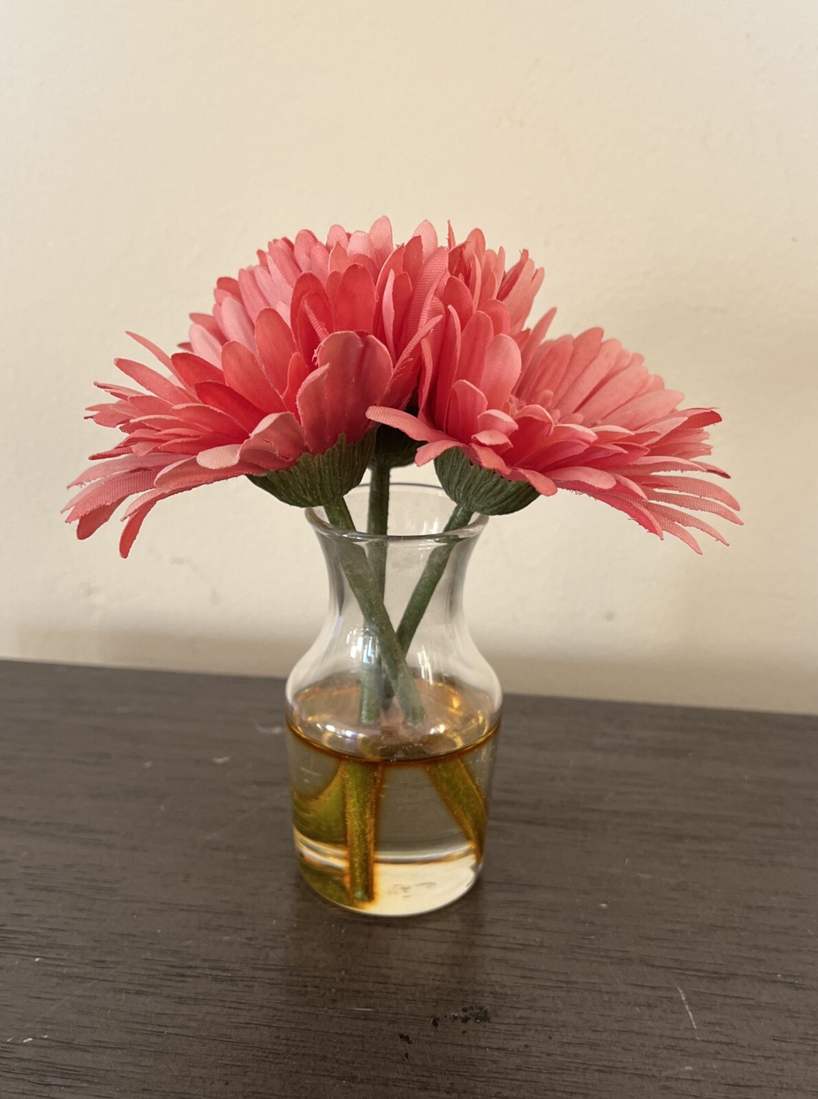 Vtg FAUX FLOWERS in FAUX WATER VASE 6 1/2″ Pink Gerbera Daisy GLASS Faux Water