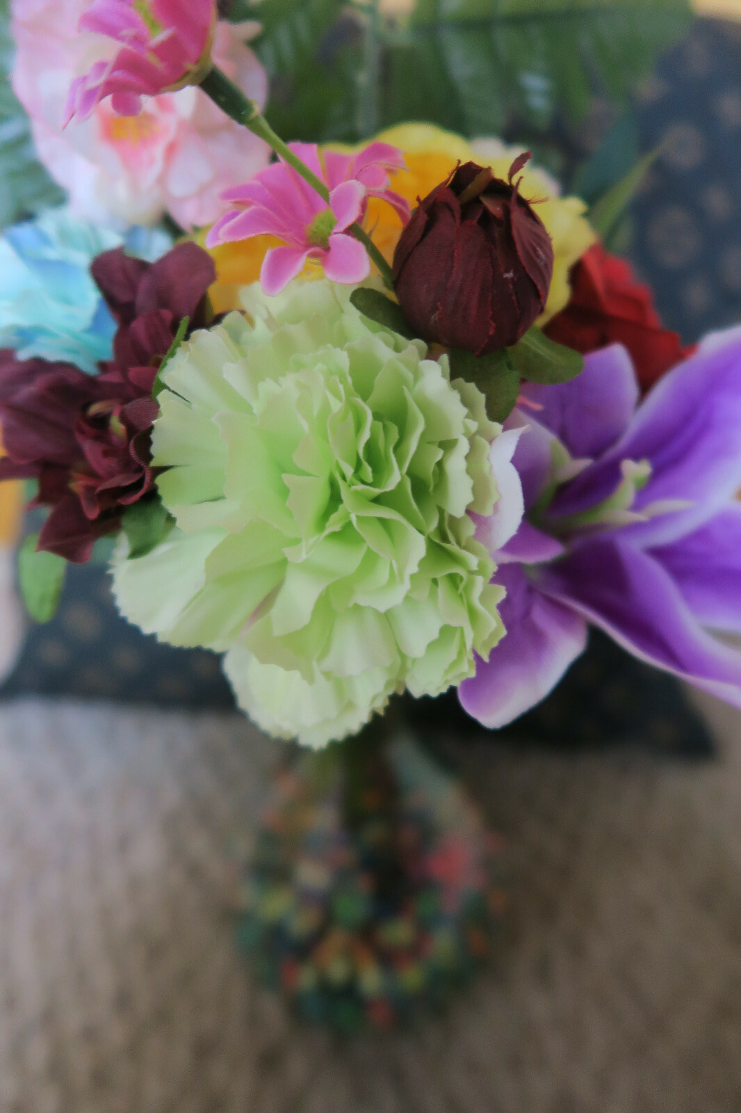 Artificial Flowers With Clear Vase And River Rocks