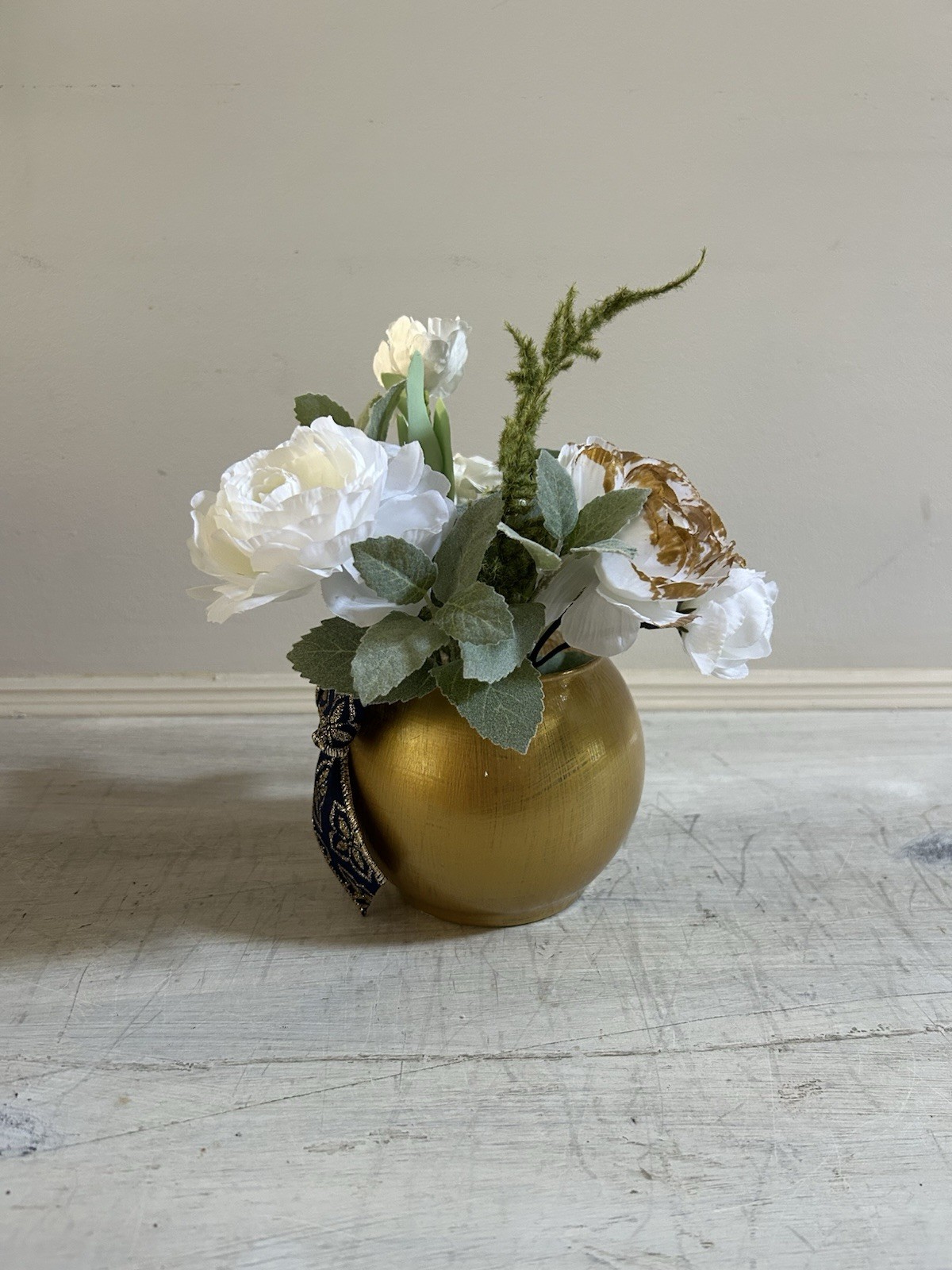 Sage Green White And Gold Floral Arrangement With Navy And Gold Bow