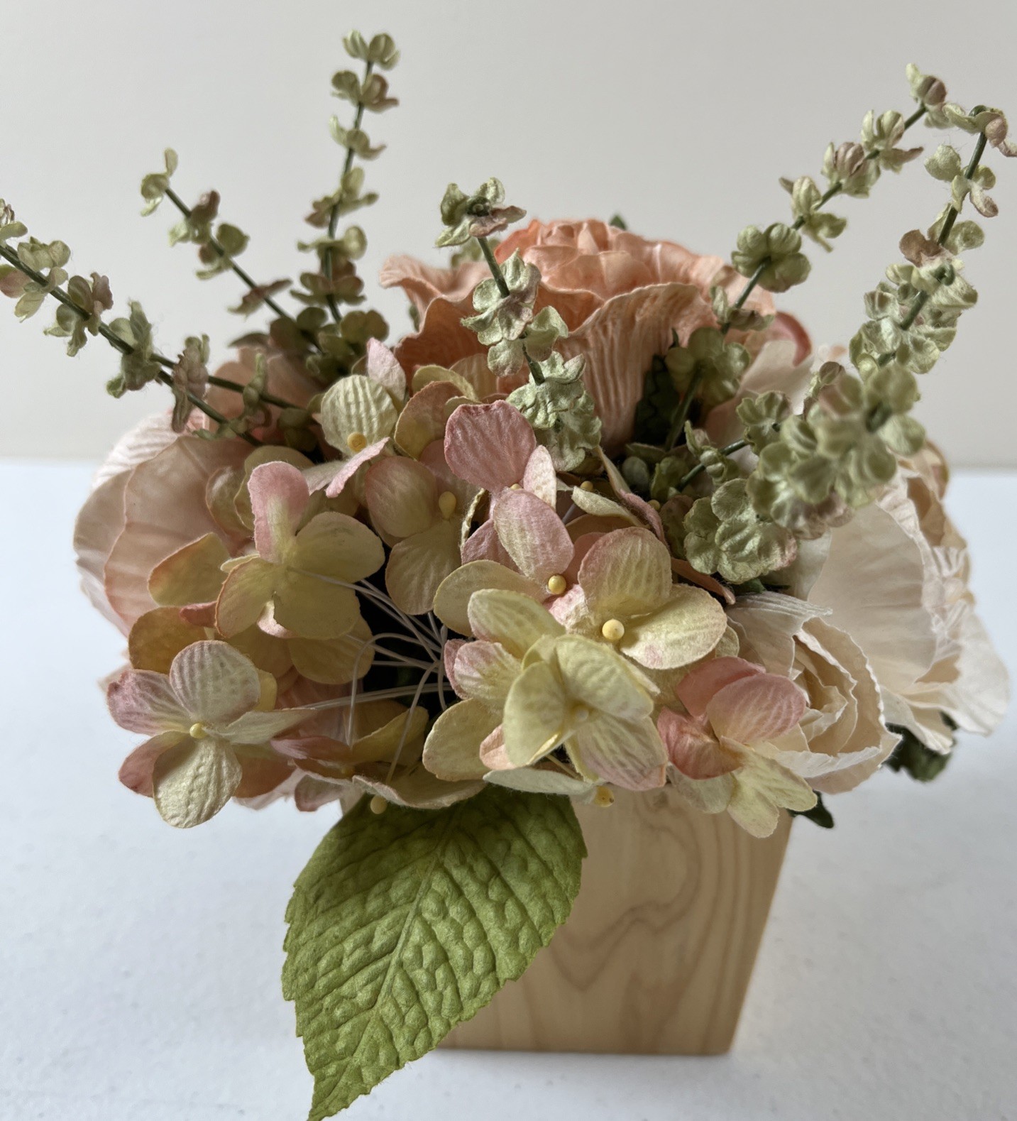 Paper Flower Arrangement With Wooden Base Hydrangeas And Roses Peach Color