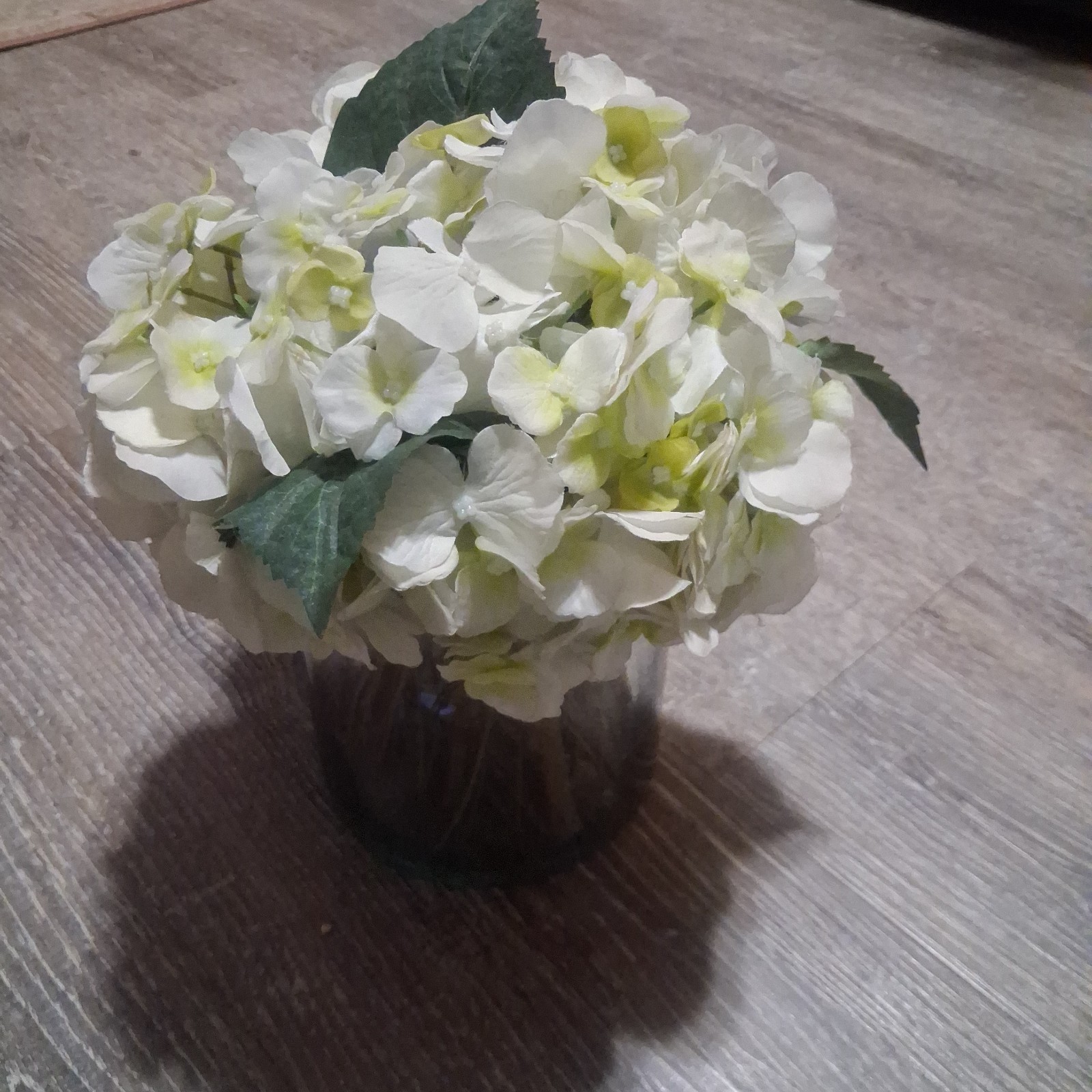 lifelike cream-white artificial silk hydrangea floral arrangement.