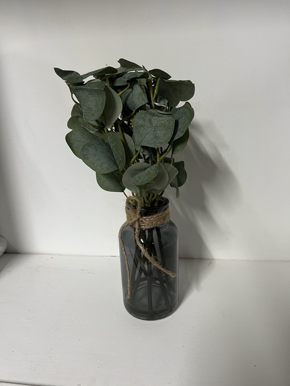 Artificial Eucalyptus Stems in Black Glass Vase with Faux Water, 14″, With Bow